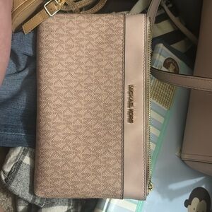 Pink leather MK clutch